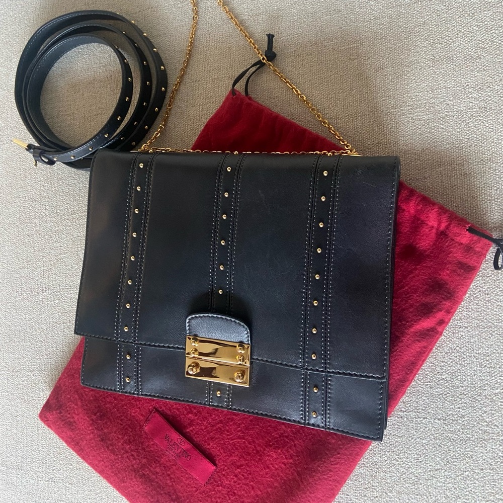 Valentino leather shoulder bag in Dark Blue with Gold Studs.